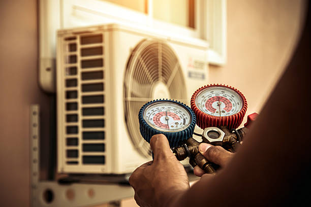 Professional Hvac technician working in Bedford, NH